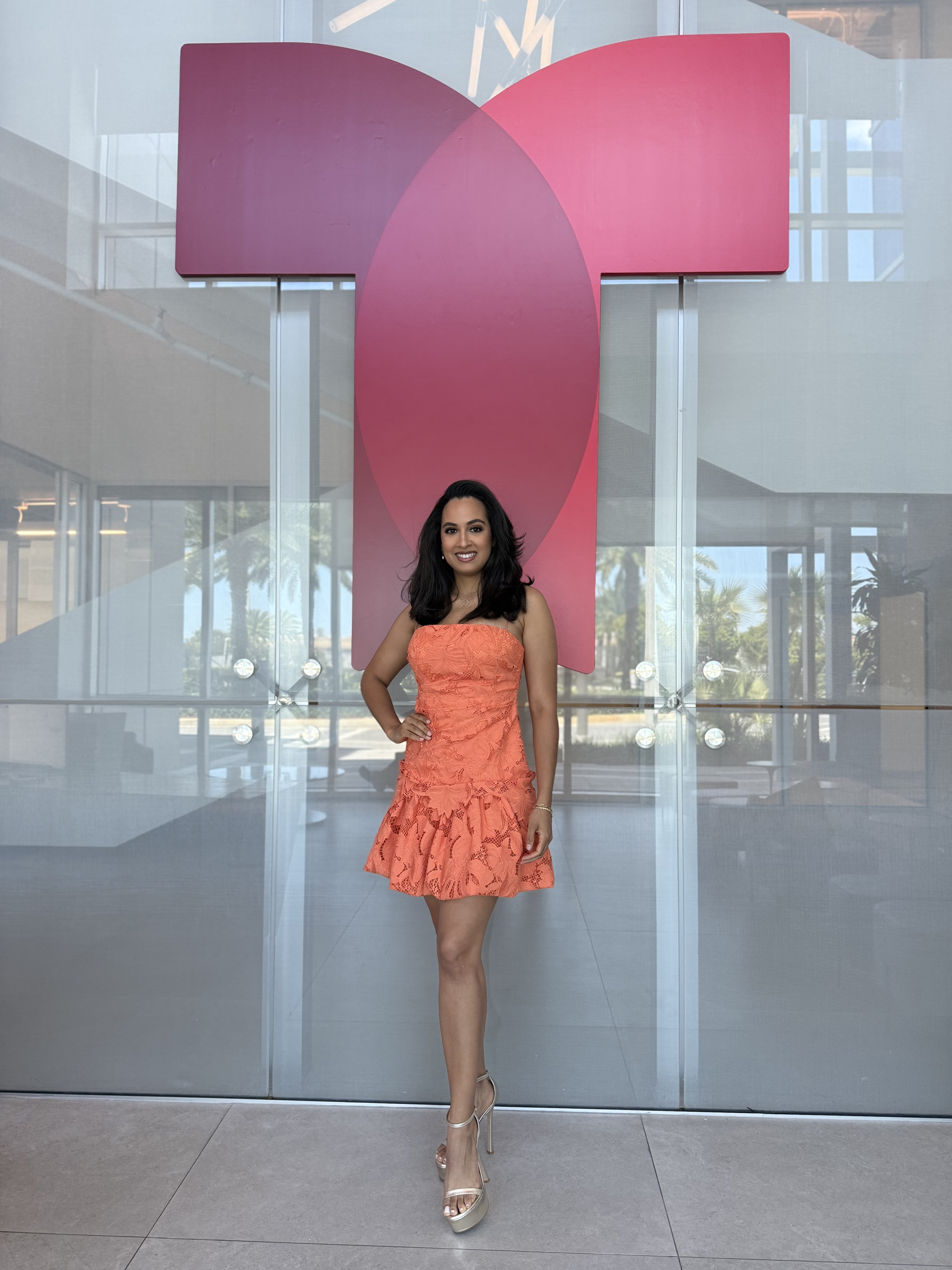 Tammy Deno in front of the Telemundo door